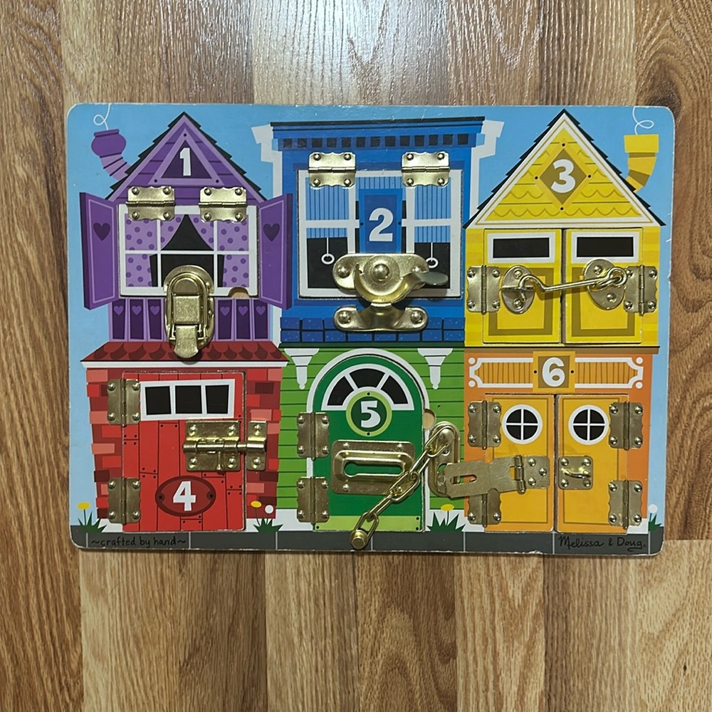 Melissa & Doug locks board